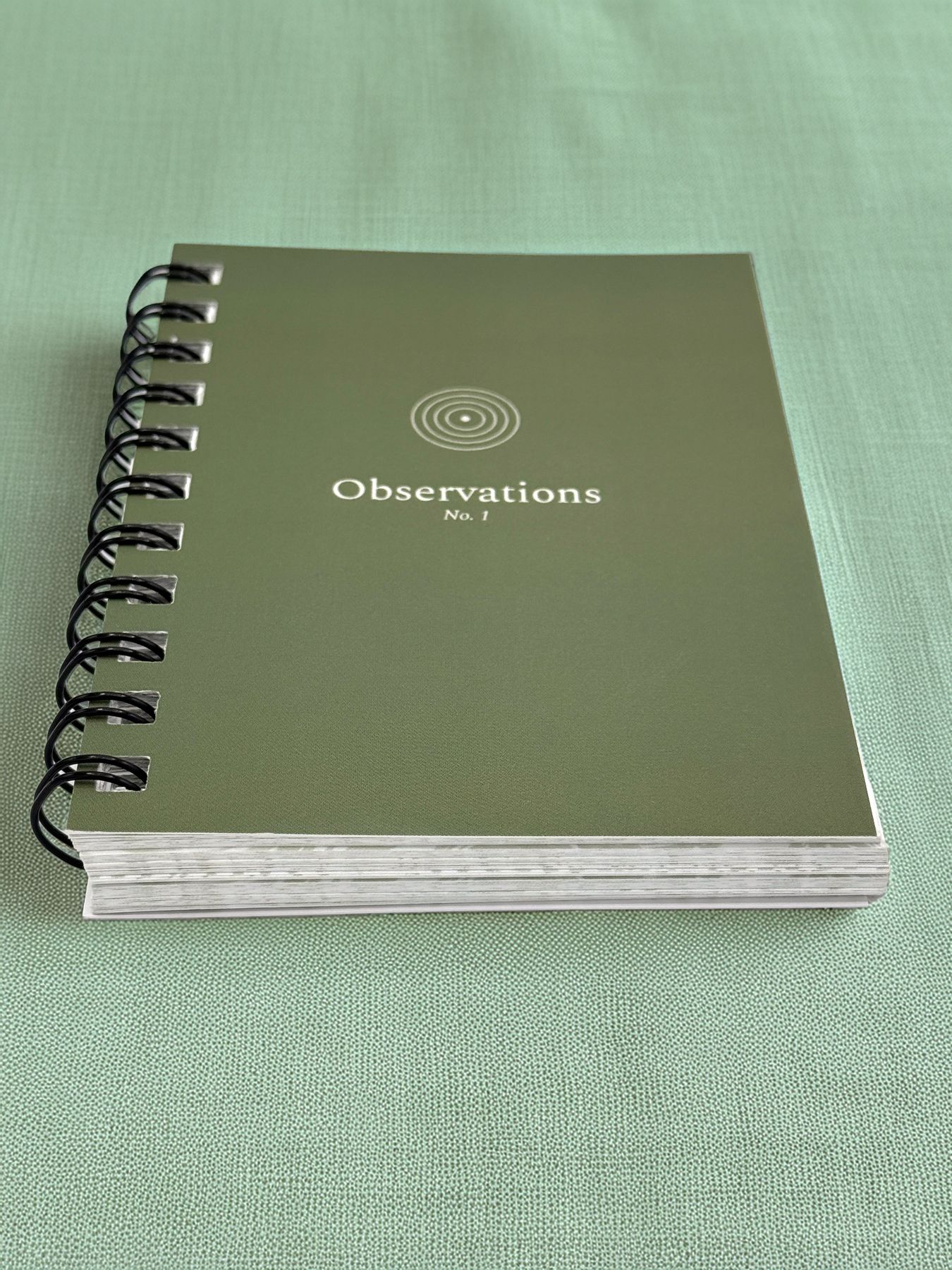 Side view of the wire-bound journal showing the thick page block