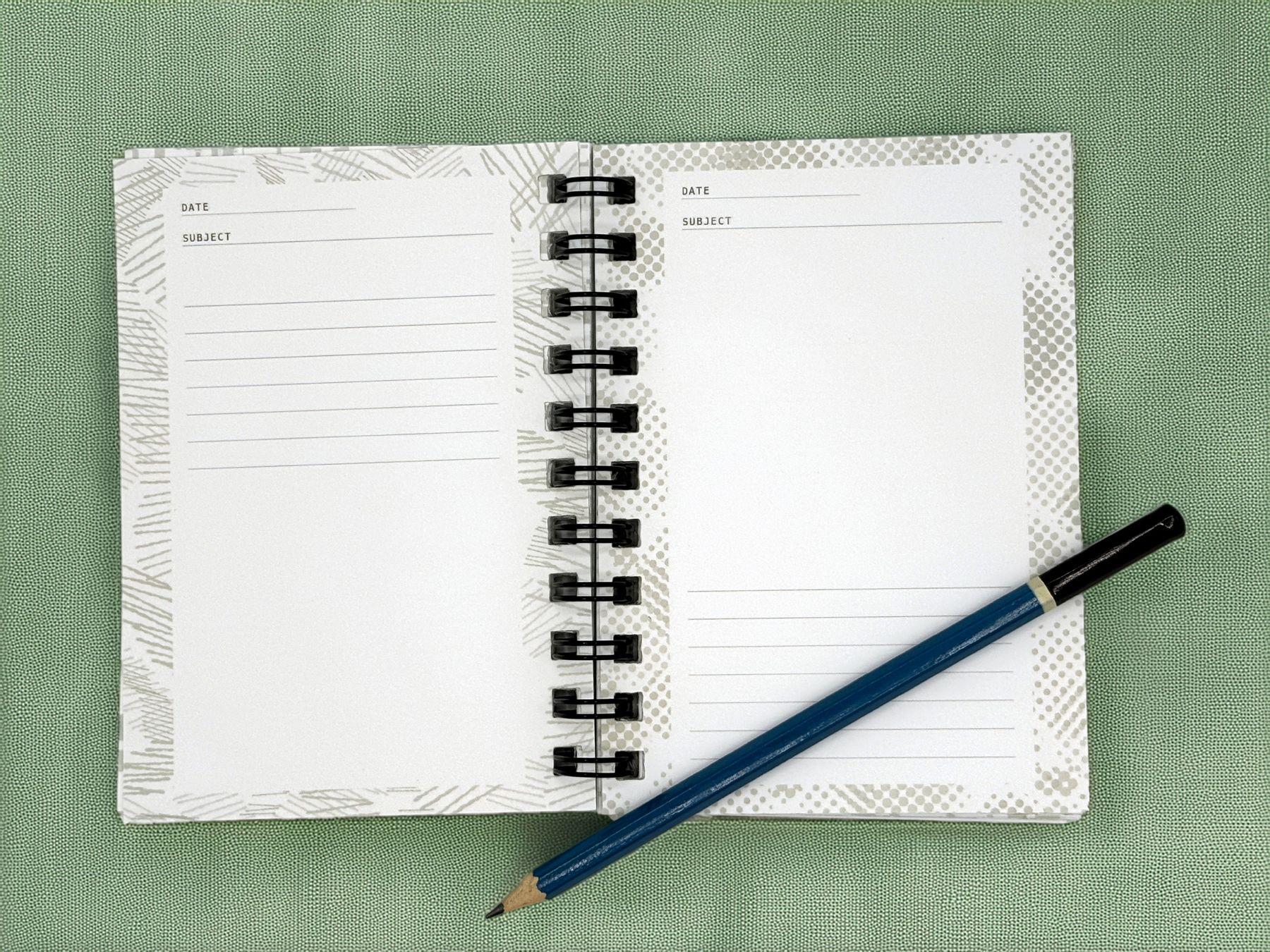Open spread with hand-drawn borders, DATE and SUBJECT headers, and a drawing pencil